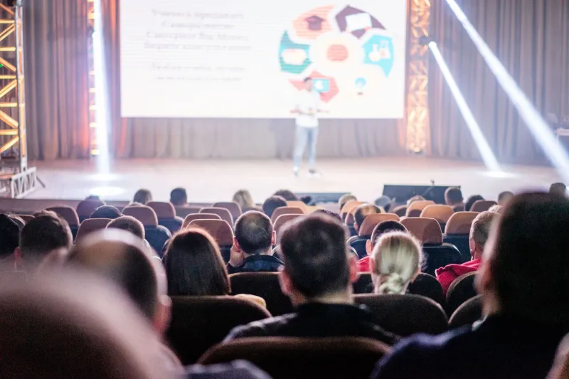 The Stage and the Stack: How the Conference Circuit Became Engineering's Most Influential Product